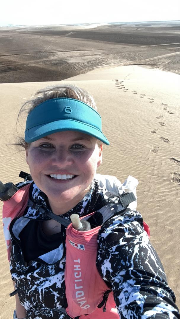 pack hiking in the dunes